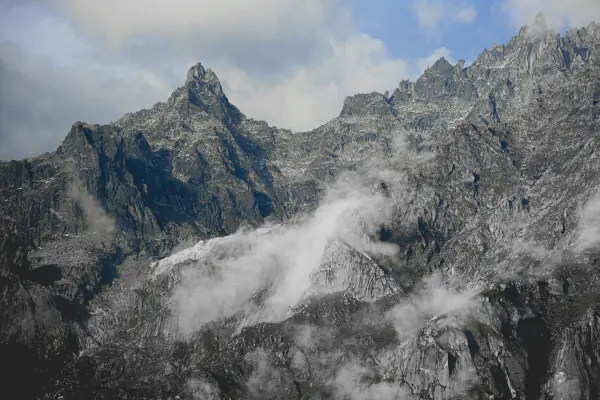 Cloud pouring over granite