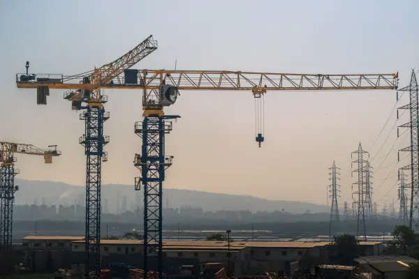 Cranes against the hills